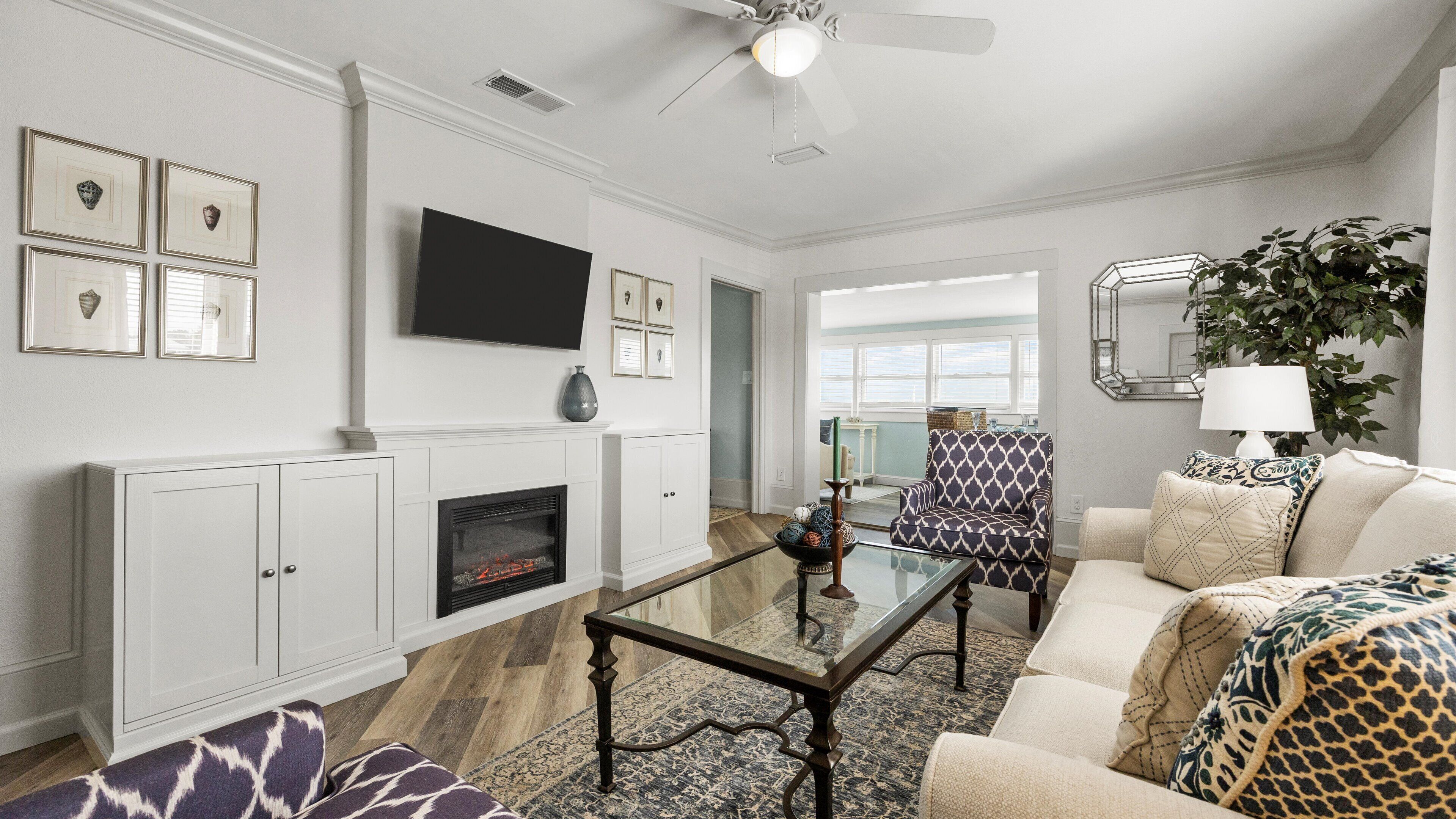 Condo, 1 Queen Bed, Patio (Eagle's Nest at Villas on the Bay) | Living area | 42-inch flat-screen TV with digital channels, fireplace