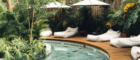 2 outdoor pools, pool umbrellas, pool loungers