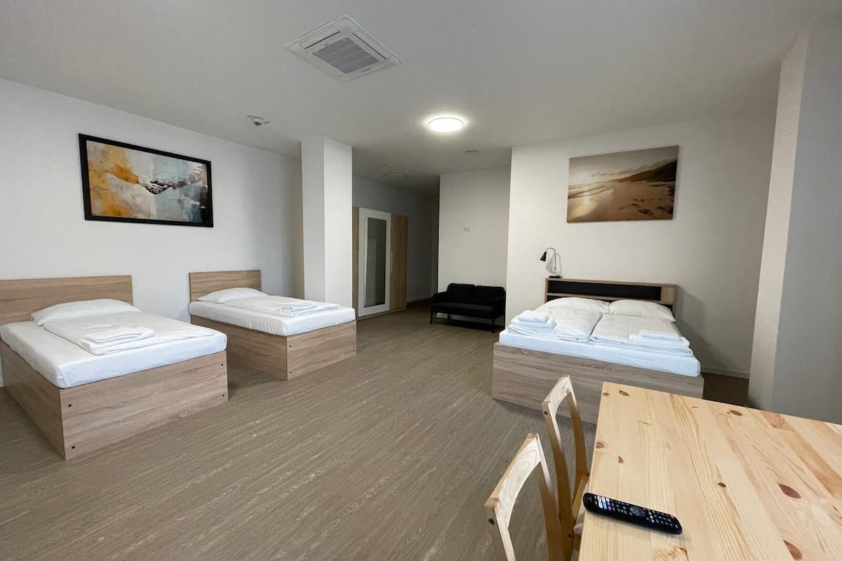 Premium Suite, Accessible, Private Bathroom | 1 bedroom, individually decorated, individually furnished, desk
