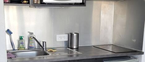 Fridge, microwave, stovetop, coffee/tea maker