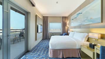 Room, 1 King Bed, Balcony, City View | Minibar, in-room safe, desk, laptop workspace