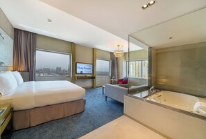 Suite, 1 King Bed, City View (One Bedroom, Jetted Tub) | Minibar, in-room safe, desk, laptop workspace