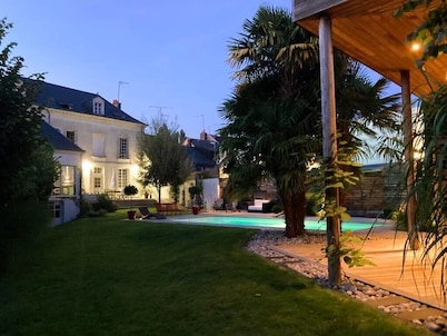 Large house with swimming pool on the banks of the Cher