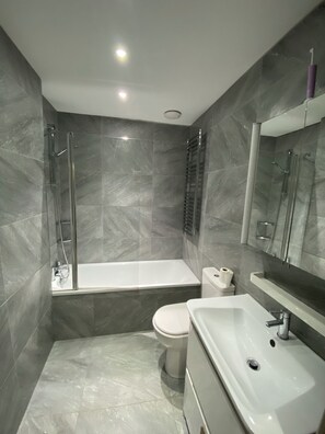 Shower, hair dryer, shampoo