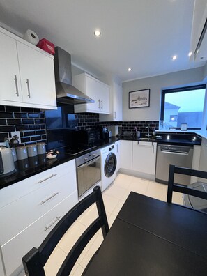 Fridge, microwave, dishwasher, electric kettle