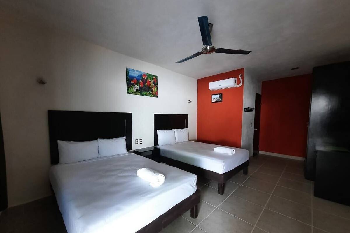 Family Studio Suite, 2 Queen Beds, Kitchenette, Garden View | Desk, laptop workspace, WiFi (free)