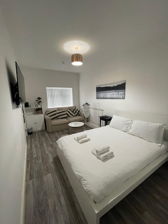 Quarto quádruplo (Room 1) | Roupa de cama. Citybreaks Rooms