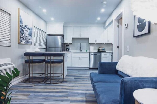 Living area - Our 'Palm Beach’ Themed 1-Bedroom Apartment
(Melbourne)