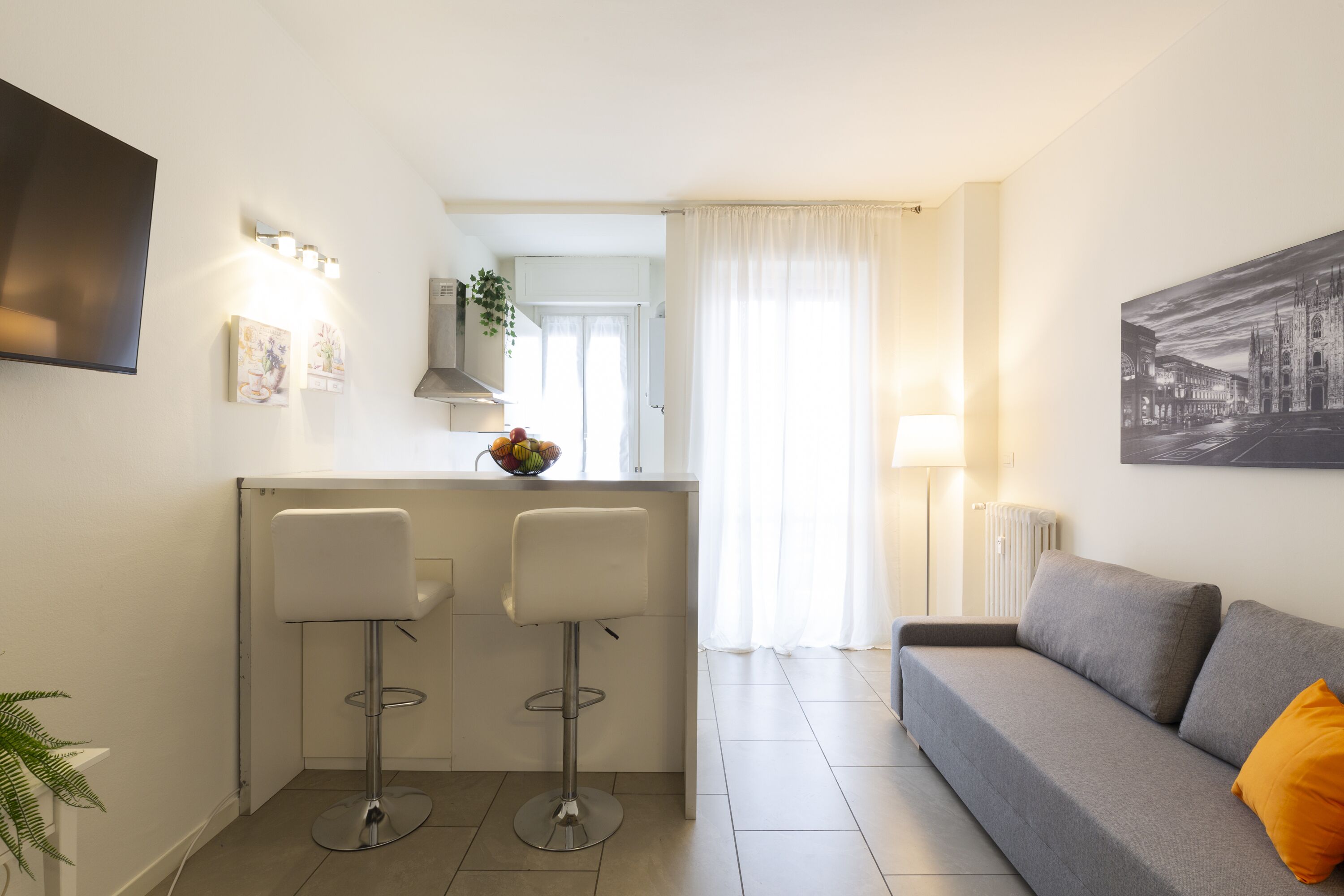 Comfort Apartment | Living area | Flat-screen TV