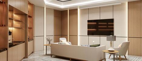 A modern living room with a sofa, chairs, a TV, and a kitchen area with wooden cabinets and a marble floor.