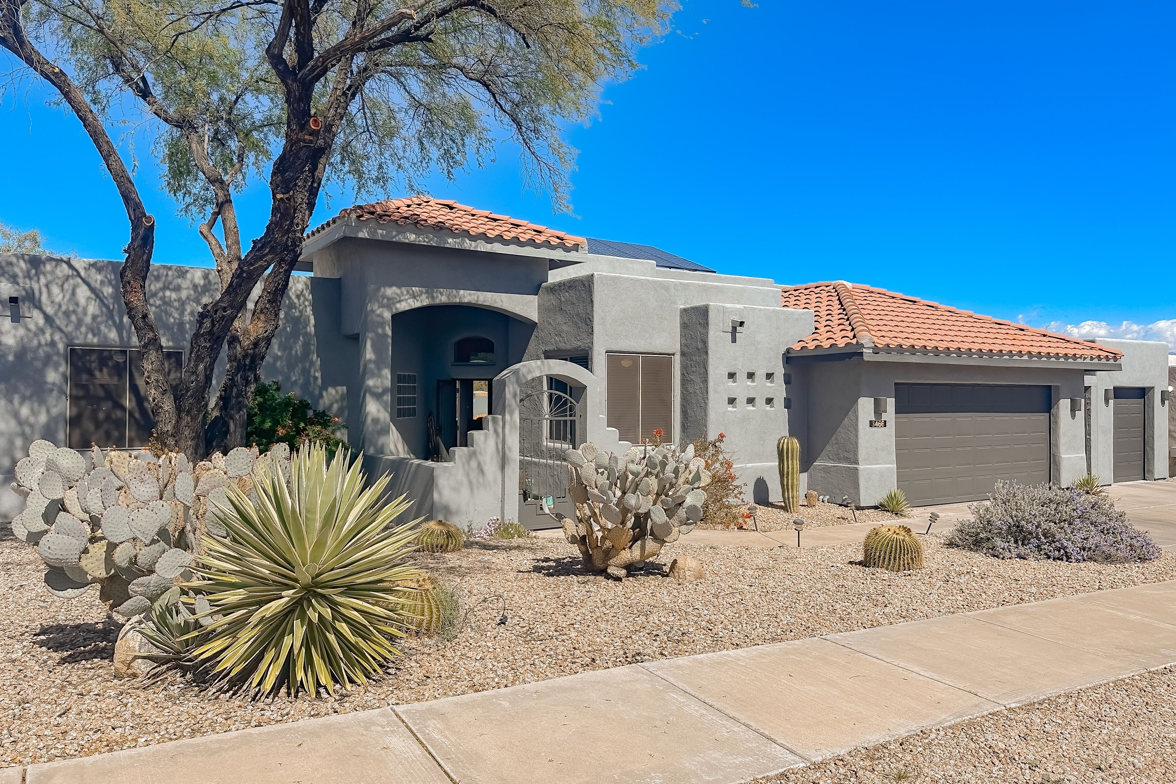 Dog-friendly retreat with lovely outdoor living space, central AC, & home office