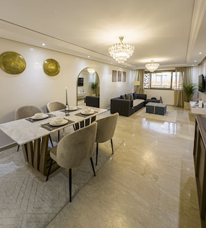 Appartement Deluxe, vue sur la ville | Aire de séjour