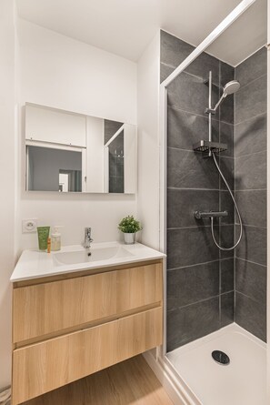 Hair dryer, towels, soap, toilet paper