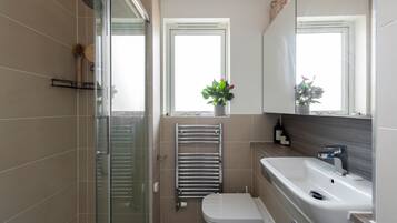 Hair dryer, towels, soap, shampoo