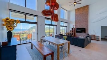 Premium Penthouse | Living area | 60-inch flat-screen TV with digital channels