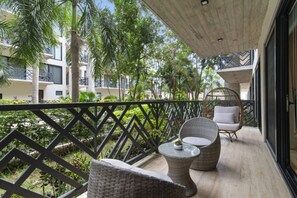 Terrace/patio - Stylish 2BR Tulum Retreat with Rooftop Pools, Private Terrace & Fitness Center! (Tulum)