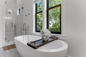 Shower, hair dryer, towels, shampoo