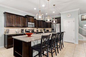 Fridge, microwave, oven, stovetop - Spacious Resort Home for Large Groups near Disney (Kissimmee)