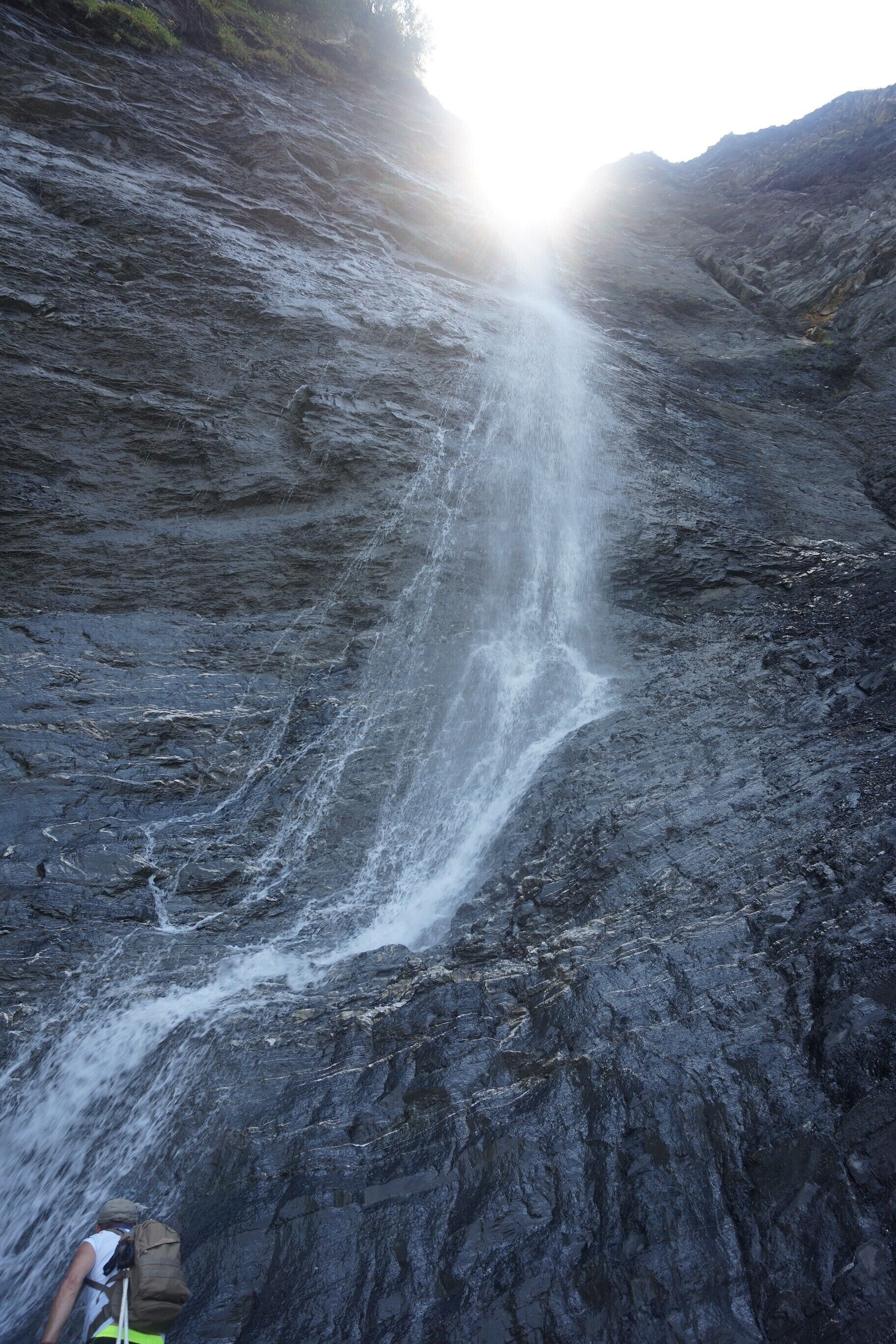 A waterfall cascading down a rocky cliff.