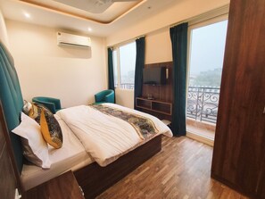 Quarto premium | Quartos à prova de som, Wi-Fi de cortesia, roupa de cama