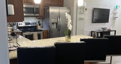 Upscale 4BR Oasis- Tranquil Patio, Prime Location