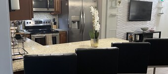 Upscale 4BR Oasis- Tranquil Patio, Prime Location