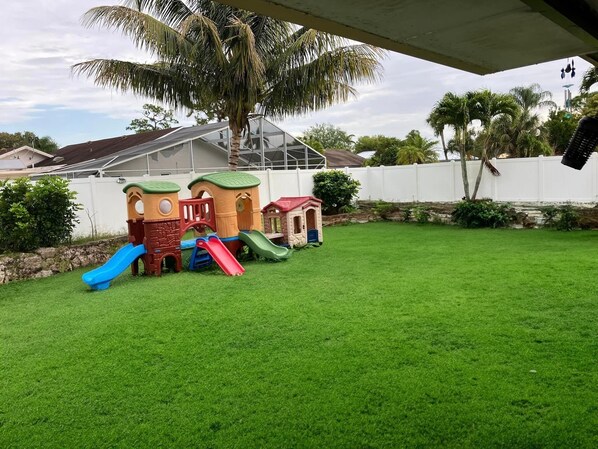 Childrenās area - Upscale 4BR Oasis- Tranquil Patio, Prime Location (Royal Palm Beach)