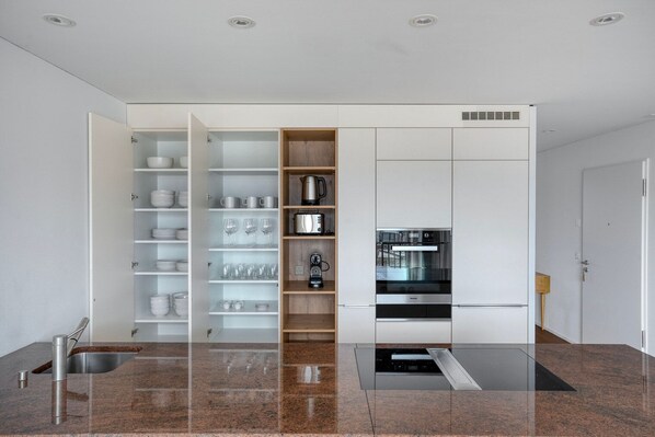 Fridge, microwave, oven, stovetop - Stylish St. Johann 2BR w/ Parking & W/D, nr River, by Blueground (Basel)