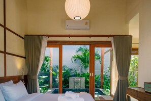 Comfort Suite | Bathroom | Combined shower/tub, deep soaking tub, rainfall showerhead - Mamori House at Koh Larn (Koh Lan)