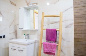 Bidet, towels, soap, shampoo
