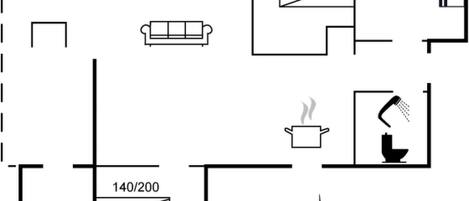A floor plan with a kitchen, a bathroom, and a living area.