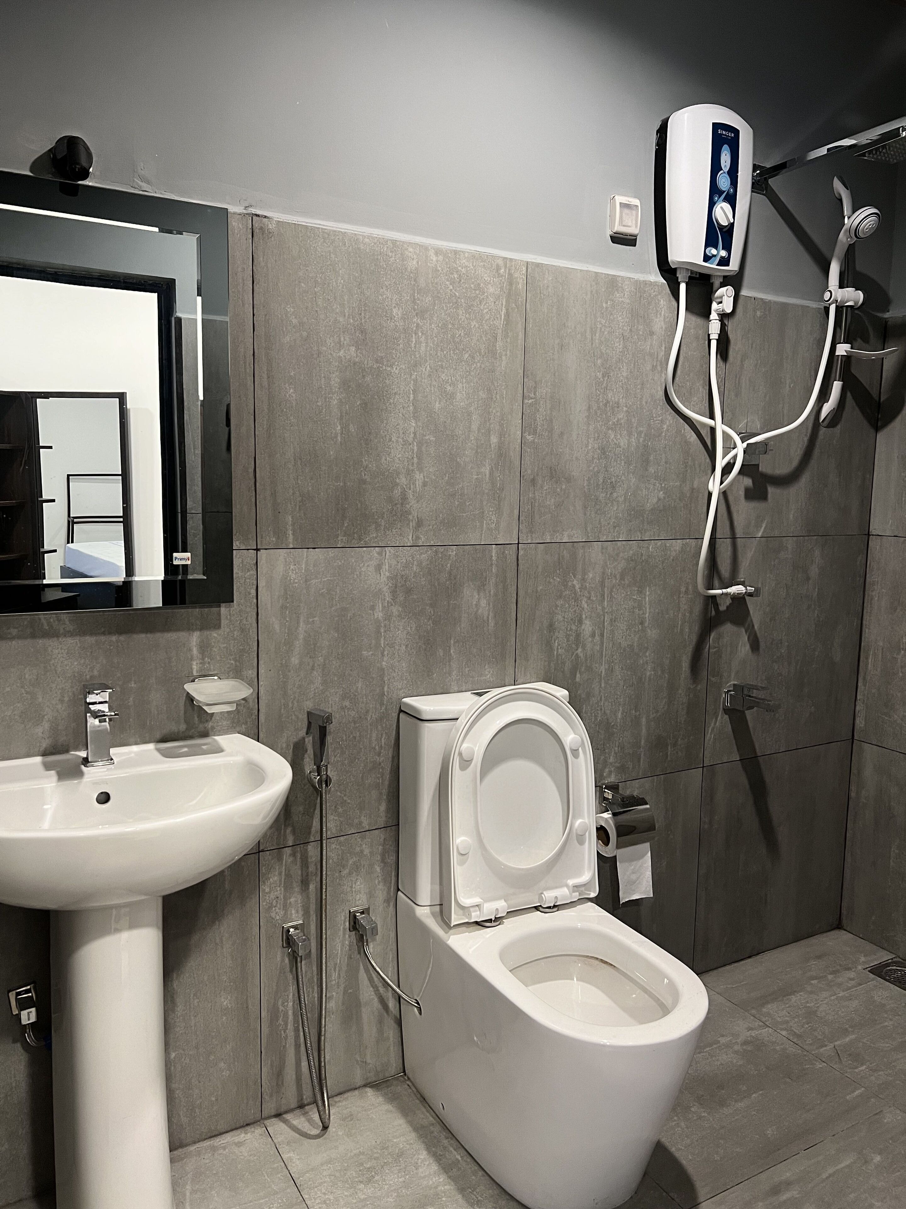 Shower, rainfall showerhead, hair dryer, towels