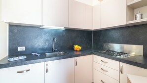 Private kitchen - Trilocale Baja Caddinas Dani (Golfo Aranci)