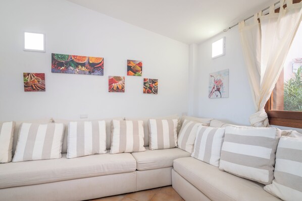 21-inch flat-screen TV with cable channels, TV