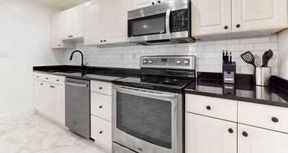 Perfectly located modern home with smart TVs, high chair, patio, W/D, & AC