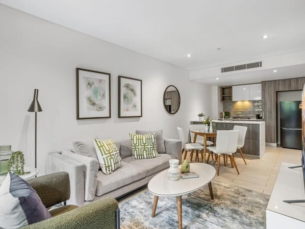 Apartment, 1 Bedroom | Living area | 1-inch LCD TV with cable channels