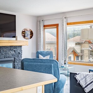 TV, fireplace, offices - "Alpen Glow" at Canmore Crossing (Canmore)