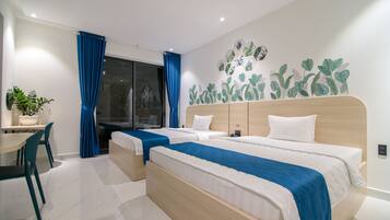 Deluxe kamer, 1 twee- of 2 eenpersoonsbedden | Een bureau, gratis wifi, beddengoed