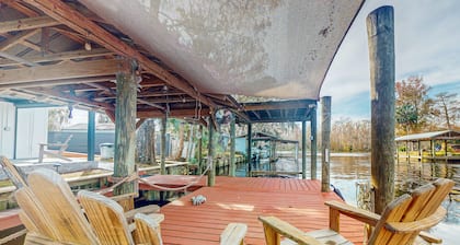 Waterfront charmer with two docks, boat ramp, office, & gourmet kitchen