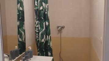 Shower, towels, soap, shampoo