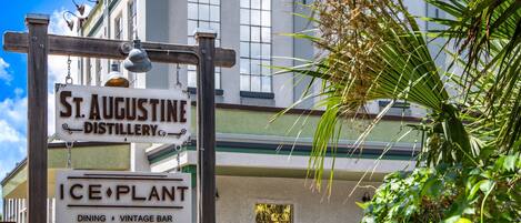 A sign for St. Augustine Distillery Co. and Ice Plant, a dining vintage bar.
