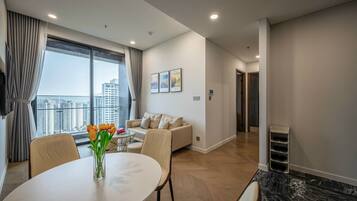 City Apartment, 2 Bedrooms, City View | Living area | Flat-screen TV