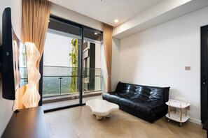 Design Apartment, 3 Bedrooms, City View | Living area | Flat-screen TV - Lumiere Riverside Luxury Apartment (Ho Chi Minh City)