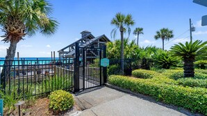 A gated entrance to a building with a sign indicating it is the 'Beach Pavilion Entrance.' - Sea Albert-King Beds-Pet Friendly-Walk2Beach (Miramar Beach)