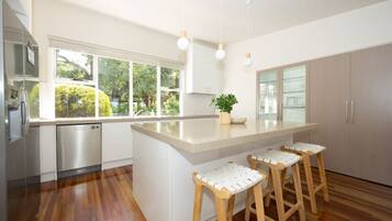 Fridge, coffee/tea maker, cookware/dishes/utensils