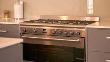Fridge, coffee/tea maker, cookware/dishes/utensils