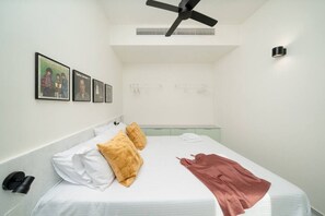 1 bedroom, desk, iron/ironing board, travel crib