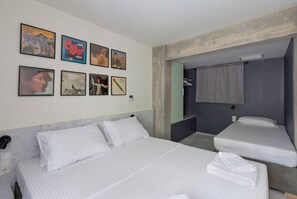 1 bedroom, desk, iron/ironing board, travel crib