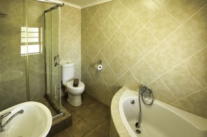 Comfort House | Bathroom | Shower, towels, toilet paper