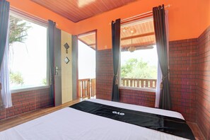 Deluxe Double Room | Bed sheets - Collection O 93742 Sidodadi Hotel Dan Resto (Wonosari)